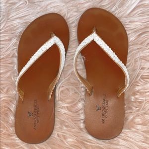 AMERICAN EAGLE LACE FLIP FLOPS (SIZE 8)